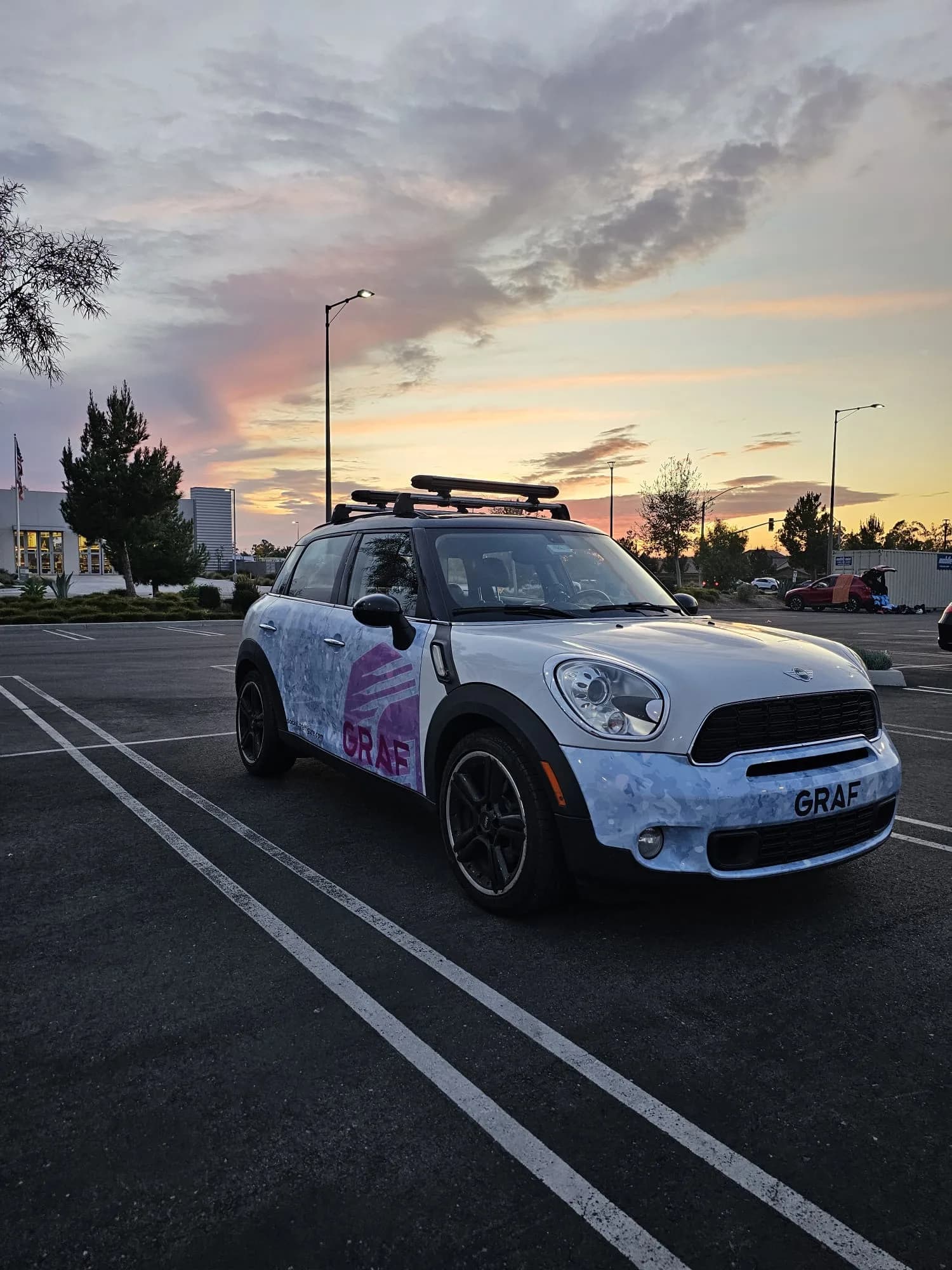 2011 Mini Countryman with roof rack and GRAF Figure Skates logo wrap